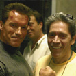 Arnold Schwarzenegger and Mario Kassar on the set 